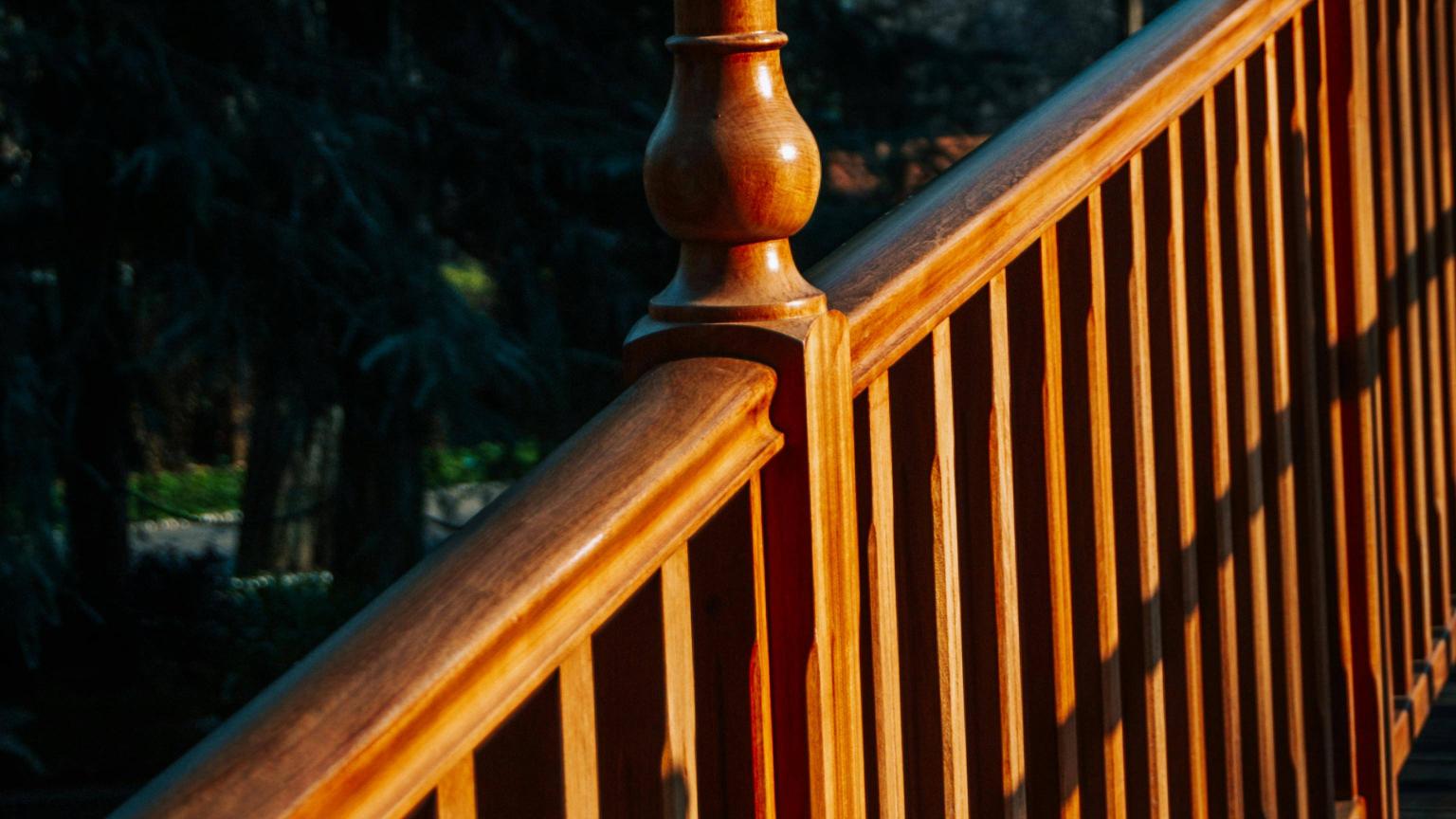 luxury brown decking rail with spindle in the sunset